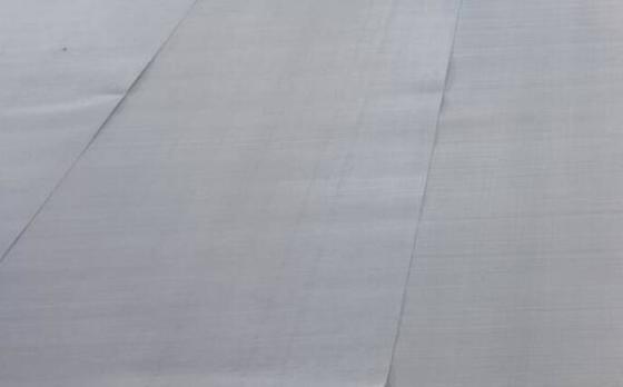 Maillot de protection contre les mouches en acier inoxydable avec revêtement en tissu et en poudre